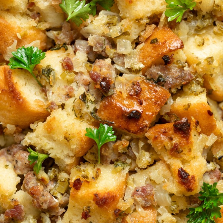 Close up view of sausage stuffing