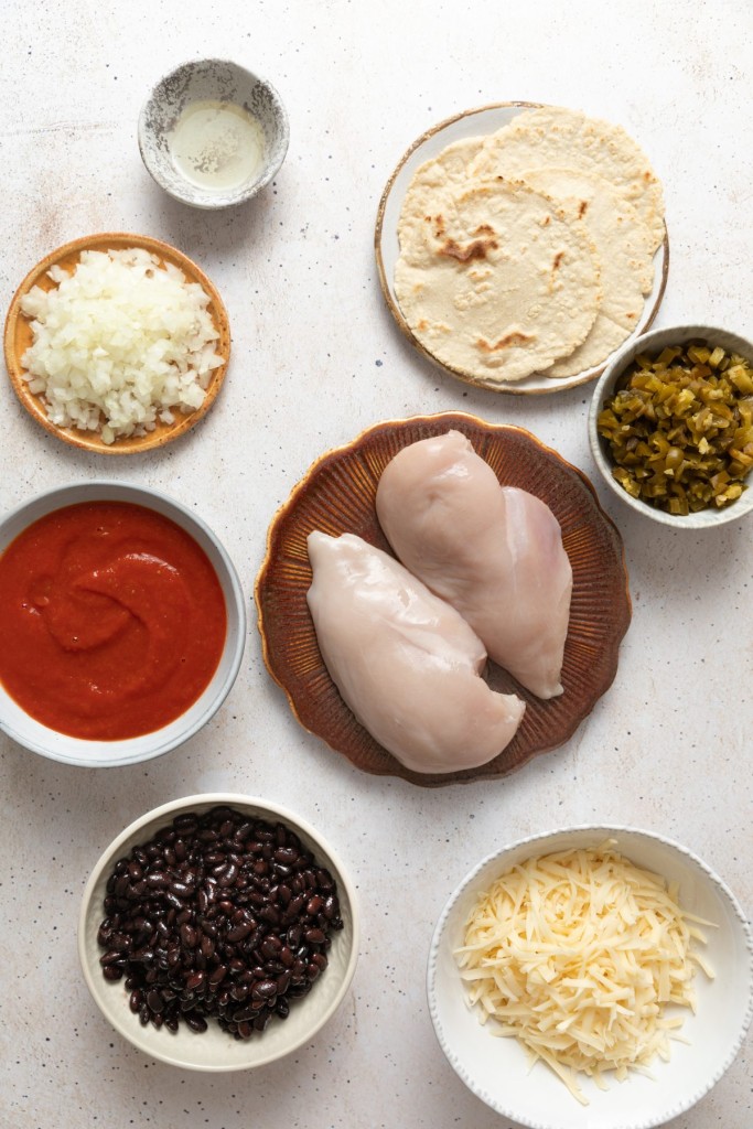 Above view of ingredients for a chicken enchilada skillet