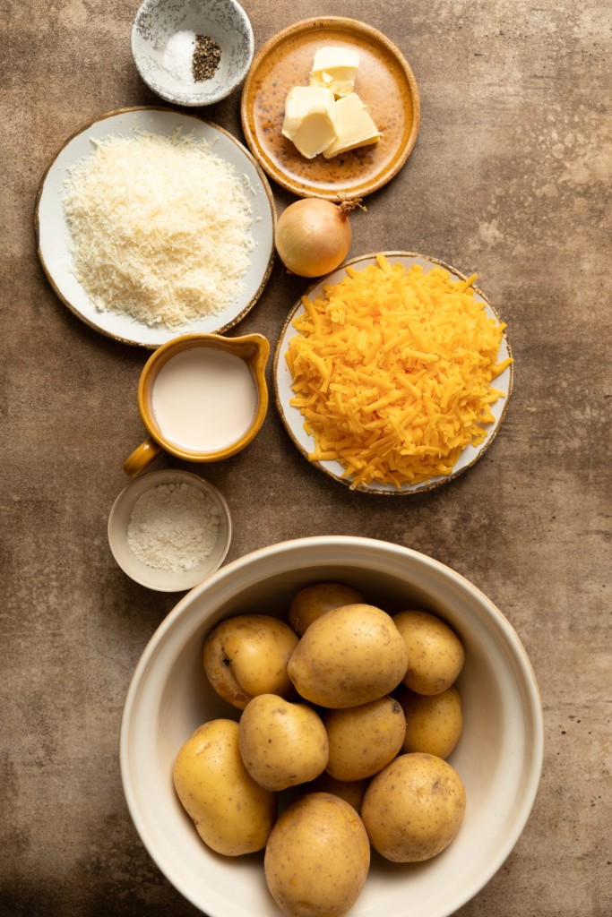 Above view of ingredients for a scalloped potatoes with cheese recipe