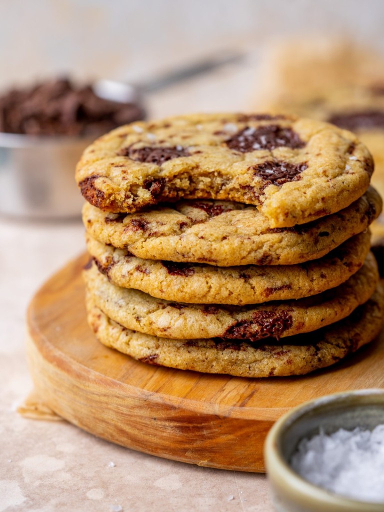 Side view of a stack of browned butter chocolate chunk cookiews