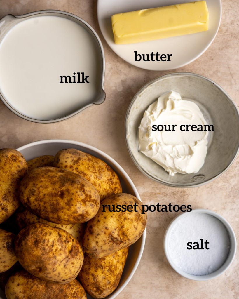 Above view of ingredients for creamy mashed potatoes