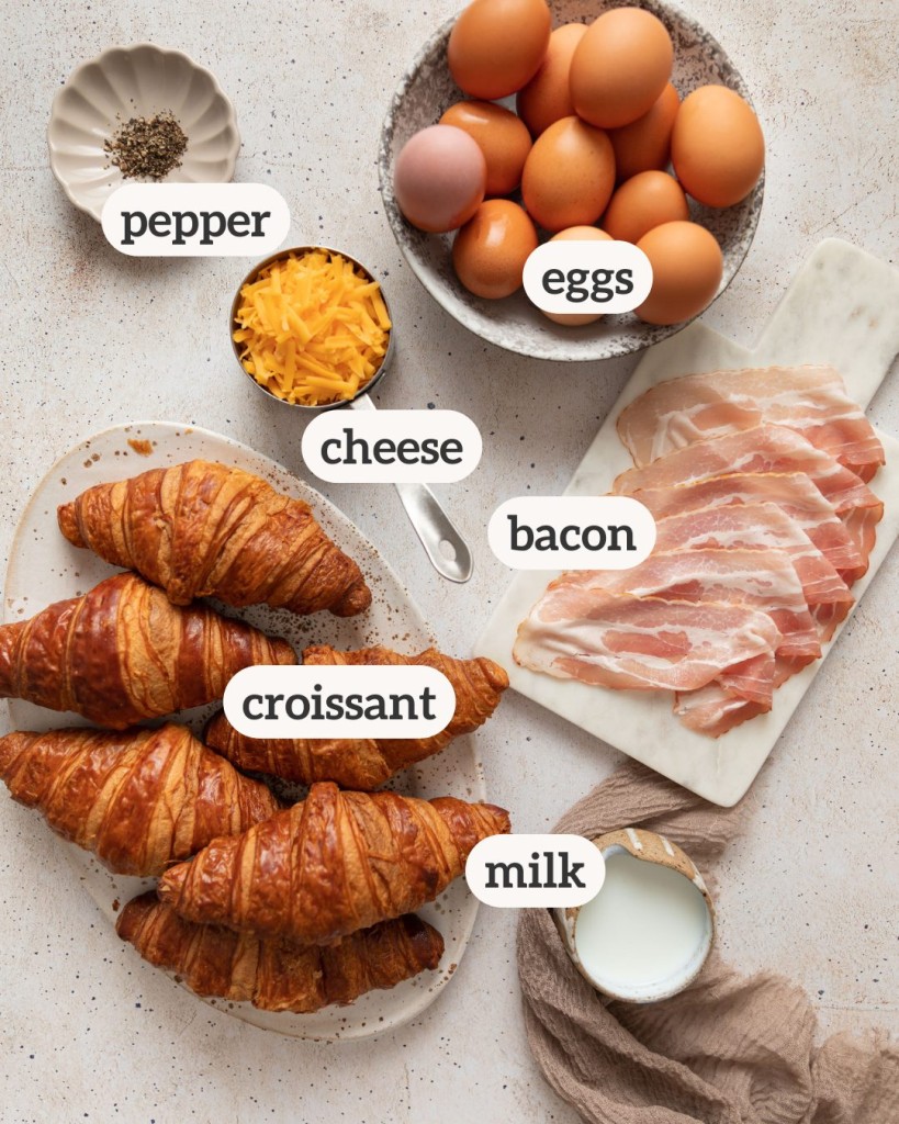 Above view of ingredients for a croissant breakfast casserole