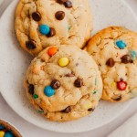 Above view of three monster cookies on a small plate