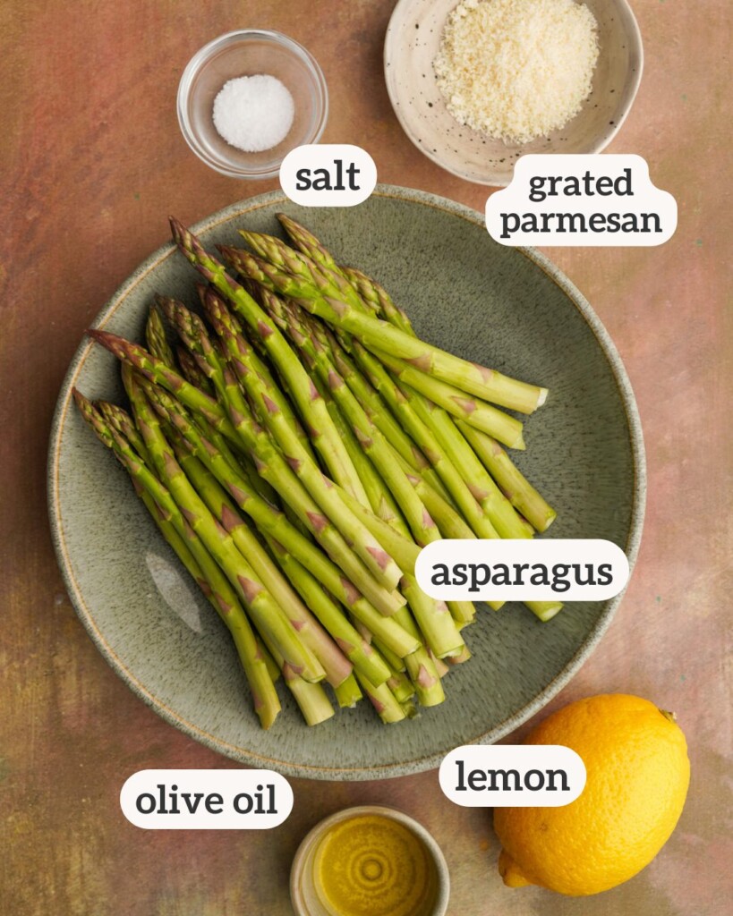 an above photo of the ingredients for air fryer asparagus with labels on them