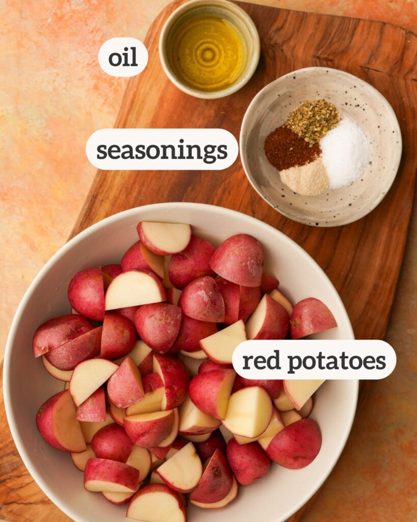 an above image of the ingredients for air fryer red potatoes with labels on them