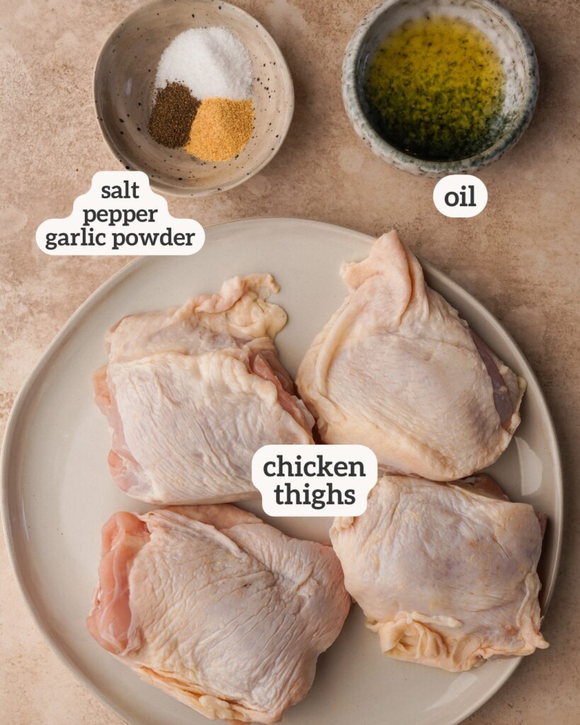Above view of ingredients for cast iron chicken thighs with labels on each ingredient