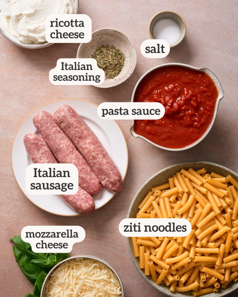 an above view image of the ingredients for baked ziti with ricotta with labels on them