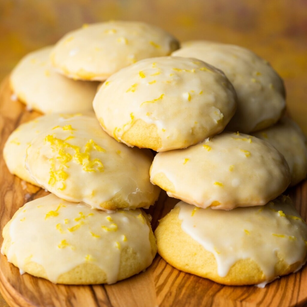 a side view photo of lemon ricotta cookies on a cutting board