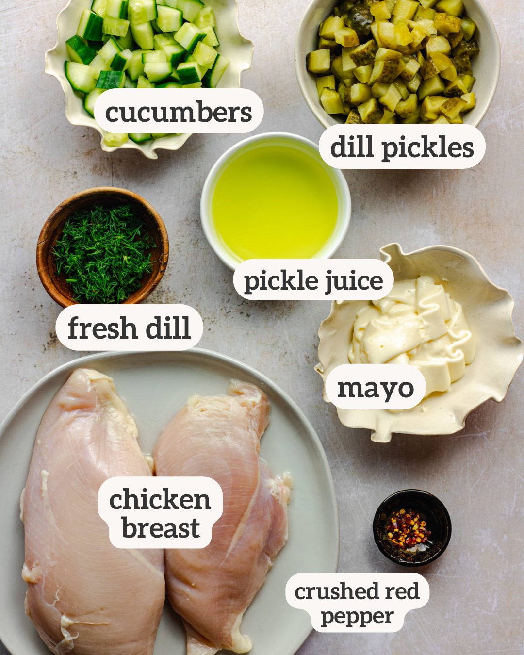 Above view of ingredients for a dill pickle chicken salad