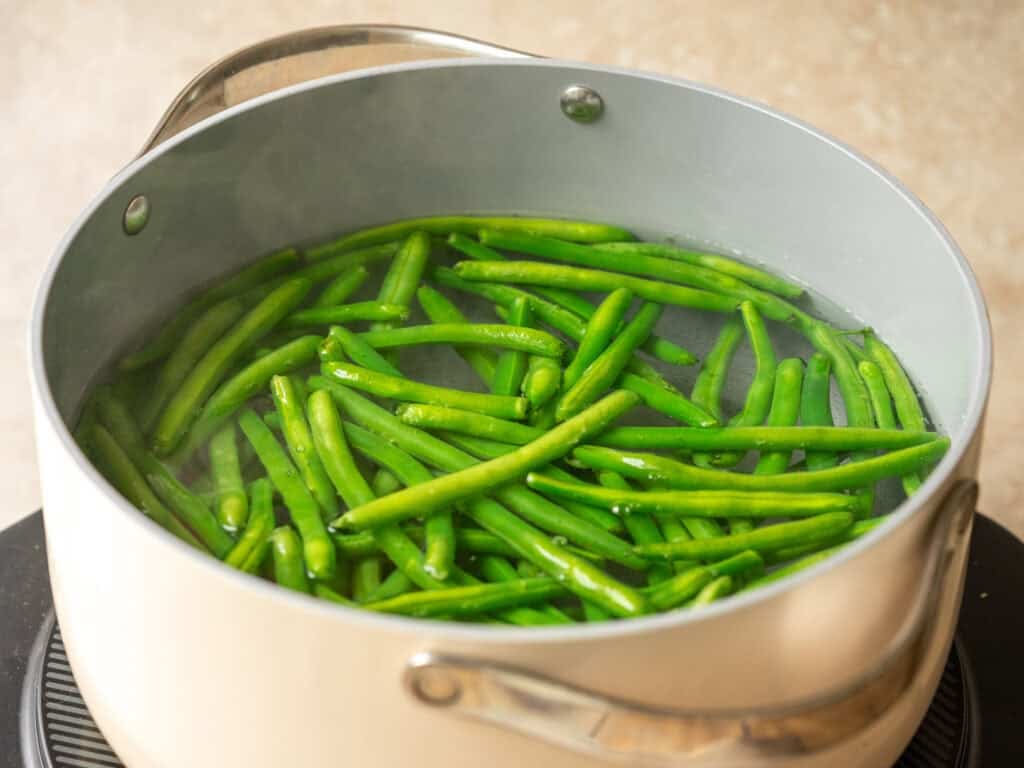 green beans in a pot of water