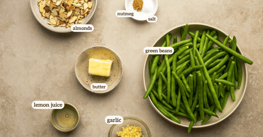the ingredients for green beans almondine in small bowls with labels on them