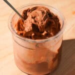 Three quarter view of a high protein chocolate creami recipe in a creami pint