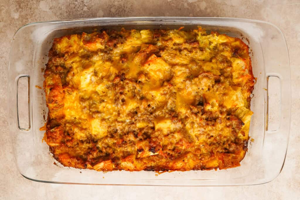 Baked strata breakfast casserole in glass casserole dish