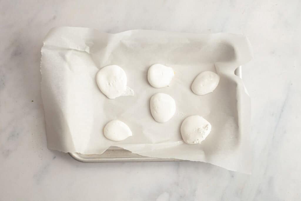marshmallow dollops on a tray 