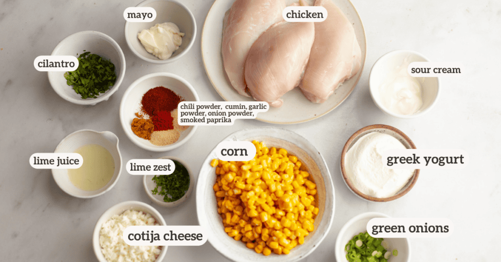Ingredients for mexican street corn chicken salad with a label on each ingredient