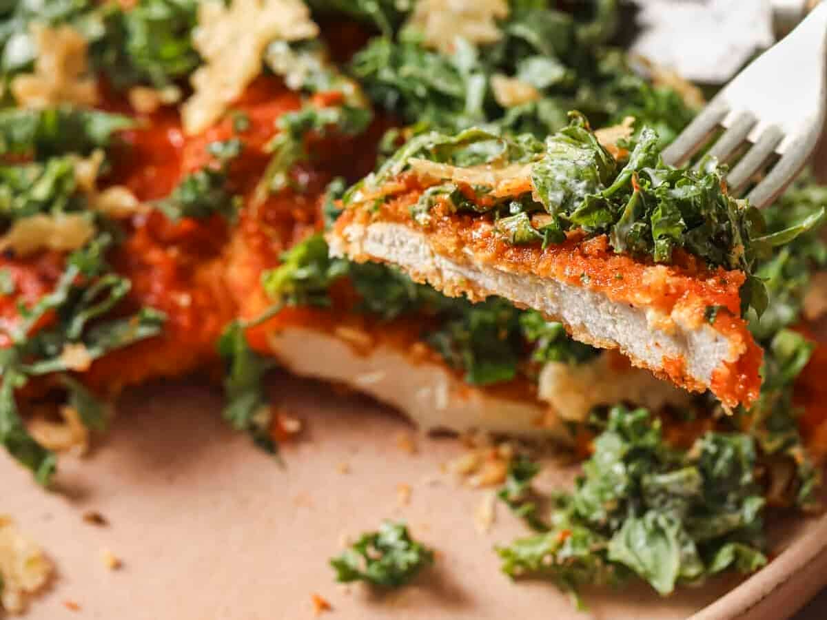 buffalo chicken cutlet with a bite taken out of it