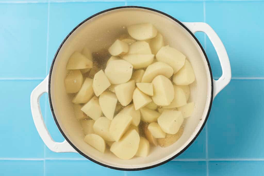 potatoes in pot to be boiled