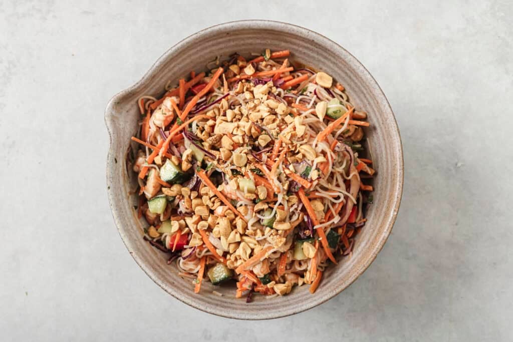 chopped peanuts on spring roll salad