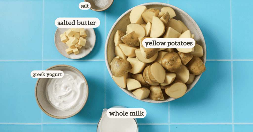 ingredients for greek yogurt mashed potatoes in ceramic bowls