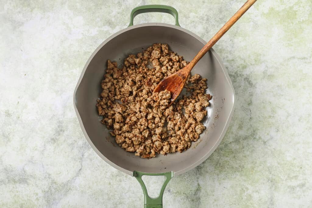 browned sausage in a pan