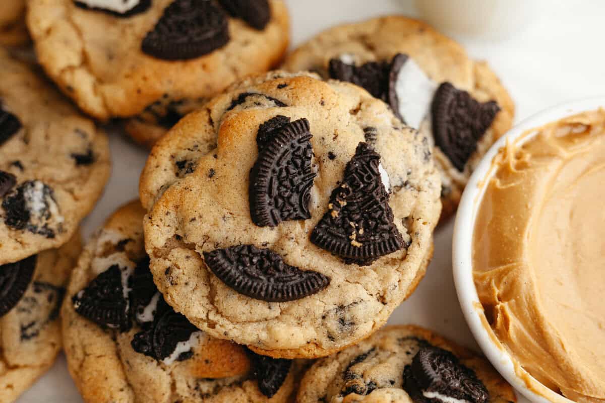 peanut butter oreo cookies stacked on a plate
