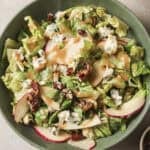apple pecan gorgonzola salad in a ceramic bowl
